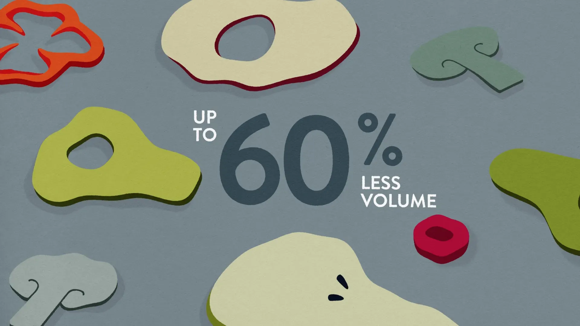 Fotograma del vídeo: rodajas de fruta y verdura sobre un fondo gris azulado, con un número enorme en el centro y el rótulo «UP TO 60% LESS VOLUME»